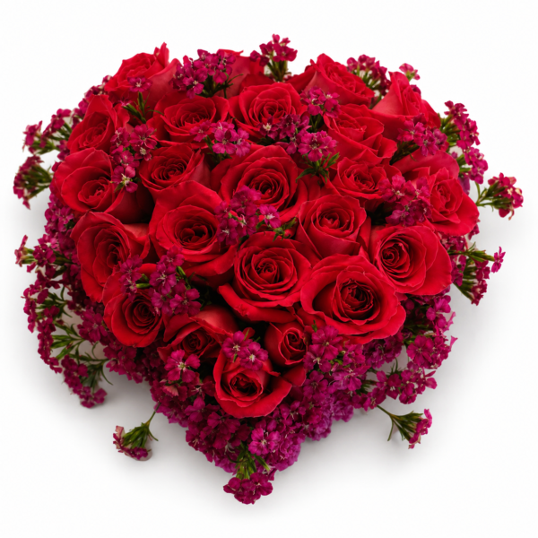 Corazón funerario de rosas rojas importadas rodeado de flores fucsia